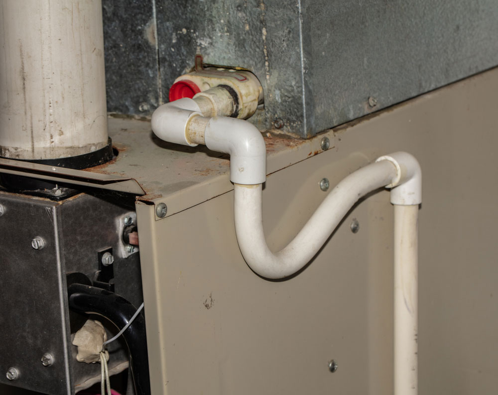 Unclogging AC Drain Line​ Boca Raton